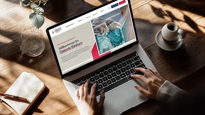 Webseite des Diakonie Klinikum Stuttgart in einem Notebook-Mockup.